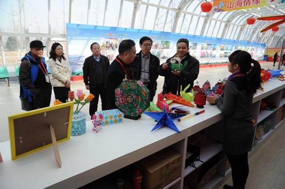 市残联副理事长唐海蛟一行到北京农业嘉年华场馆察看参展职康项目
