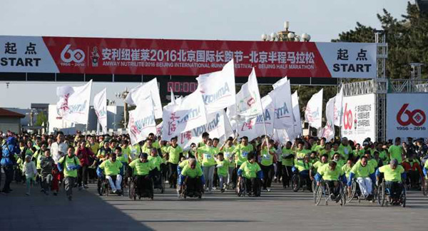 北京市残疾人联合会-我市残疾人轮椅方队参加2016北京国际长跑节