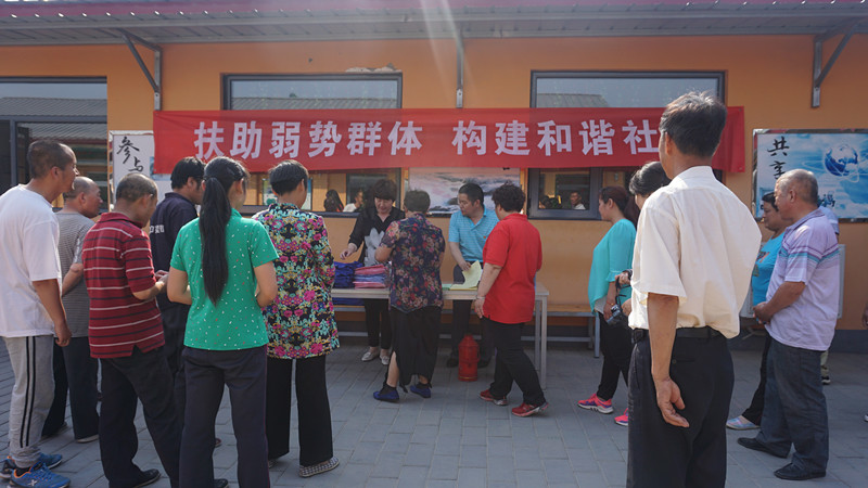 北京市残疾人联合会-房山区张坊镇残联开展助残日法律宣传活动